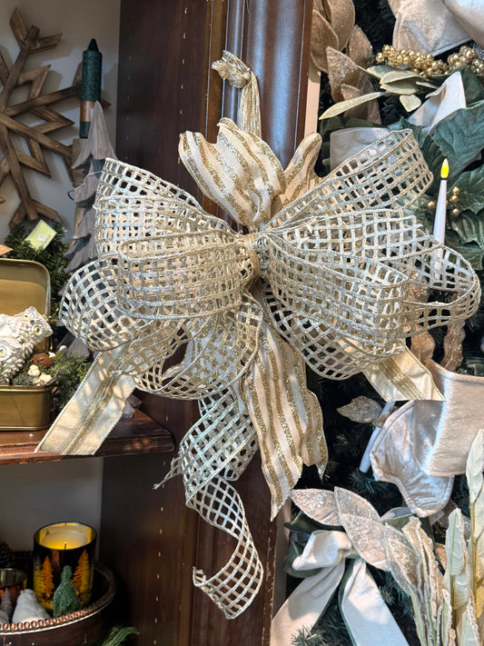 Large gold mesh wired ribbon bow with glitter stripe accents, holiday décor