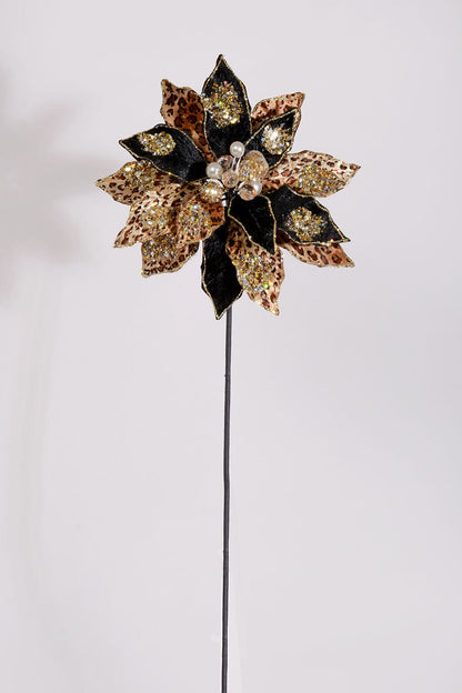 Artificial poinsettia flower with leopard print and black velvet petals, gold glitter accents, and pearl center on a stem