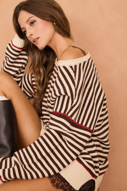 Brown and ivory striped knit pullover sweater with red contrast trim and drop shoulders