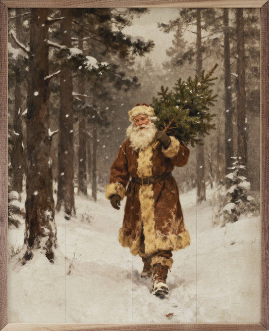 Framed vintage oil painting of Santa carrying a pine tree through snowy forest