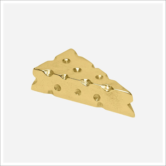 Gold metallic cheese wedge sculpture with holes and textured surface