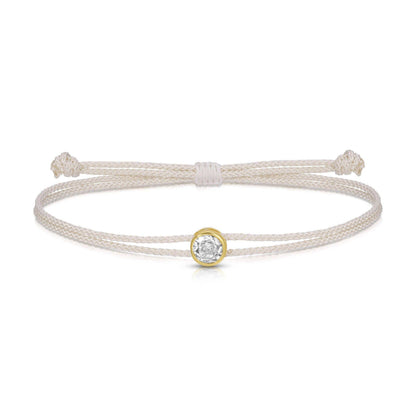 Cream braided adjustable slider bracelet with gold bezel crystal charm centerpiece