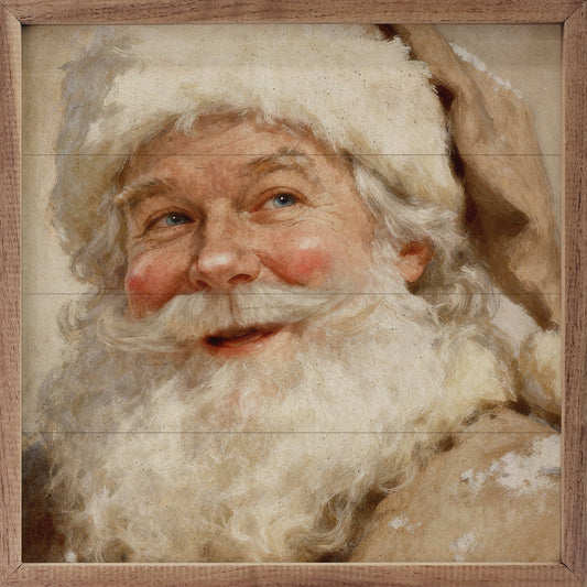 Framed oil painting portrait of Santa Claus with white beard and fur hat