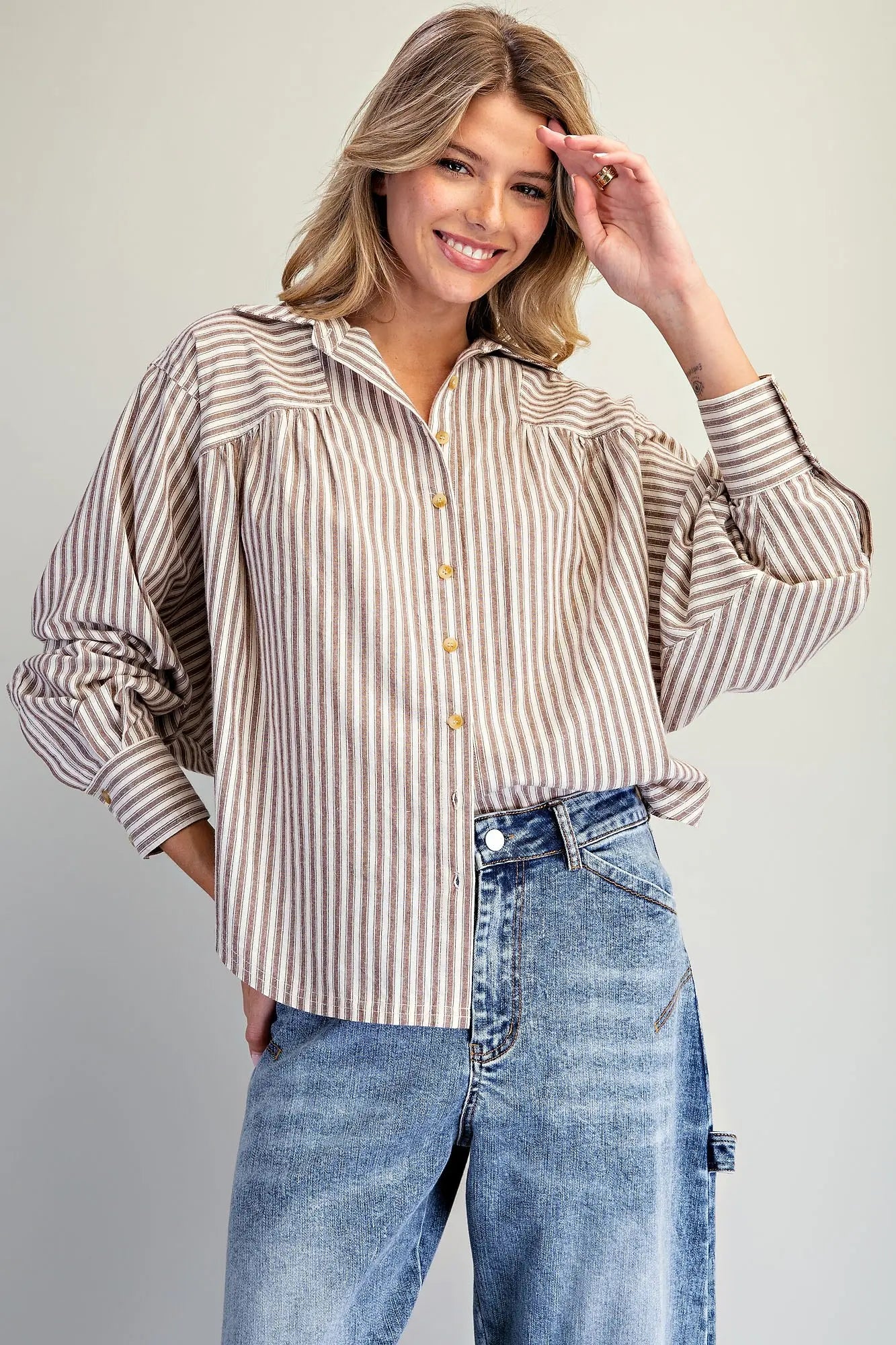 Brown and ivory striped button-down blouse with dolman sleeves and spread collar