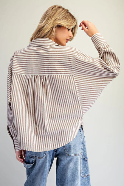 Brown and white striped dolman sleeve button-down blouse, back view
