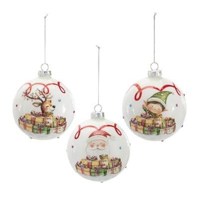 White glass ball ornaments with deer, elf, and Santa designs surrounded by gifts