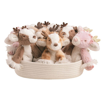 Woven rope basket filled with assorted plush reindeer stuffed animals in brown, white, and pink