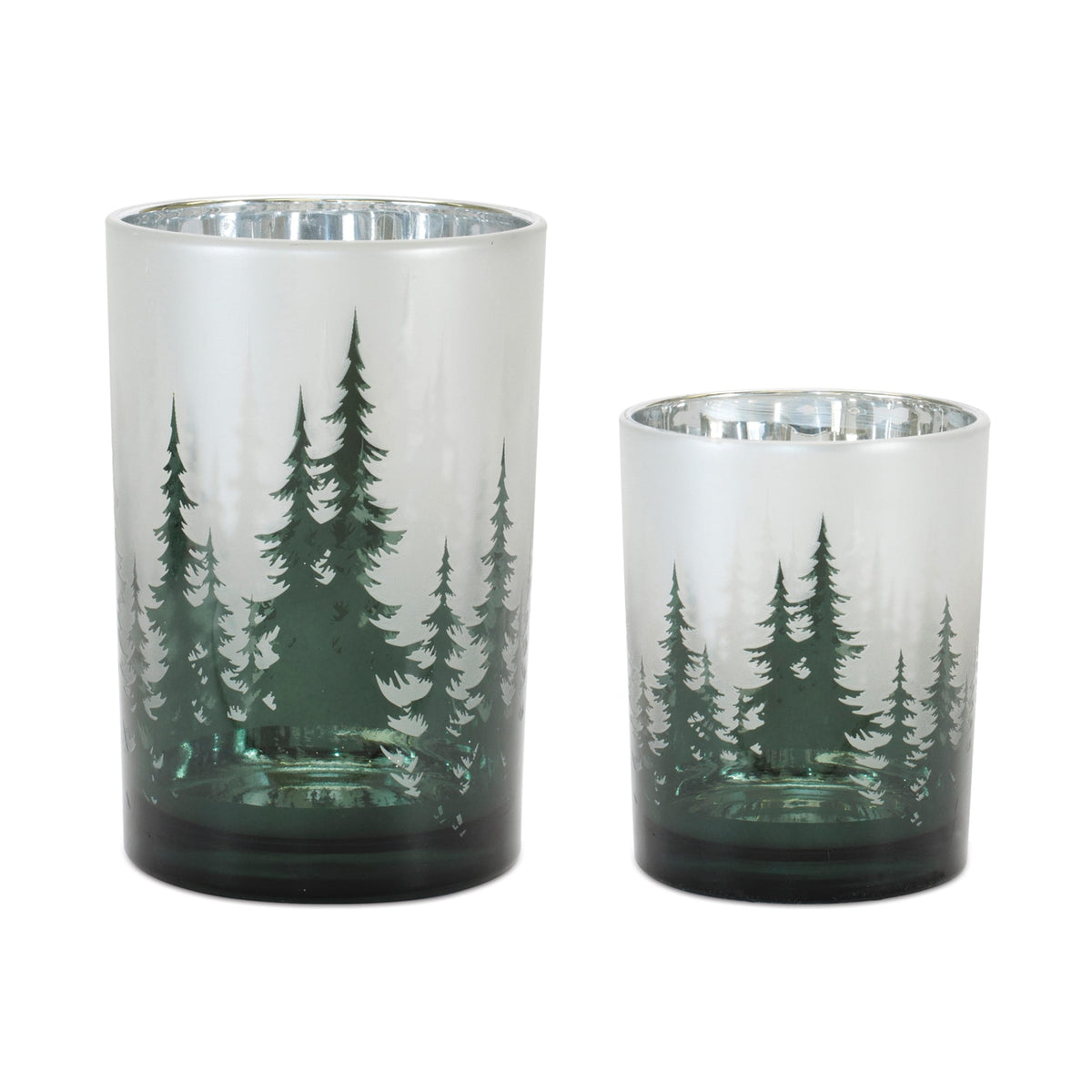 Two green frosted glass candle holders with pine tree silhouette design, silver interior