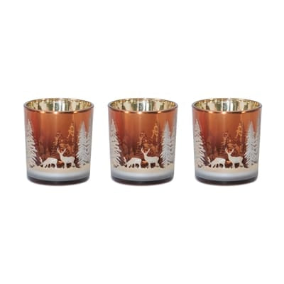 Set of three copper glass votive holders with winter deer and forest scene