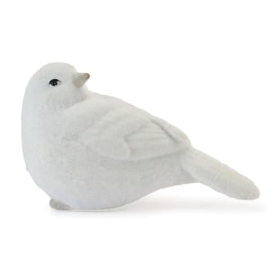 Small white resin bird figurine with black eye, side profile view