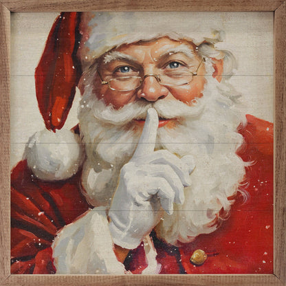 Framed oil painting of Santa Claus holding finger to lips in shh gesture