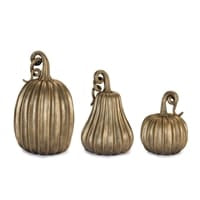 Set of 3 antiqued gold ribbed pumpkin figurines in small, medium, and large sizes