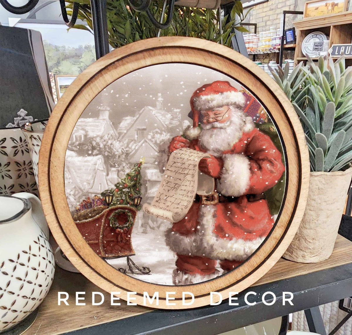 8-inch round Santa Claus canvas art in double-layered Early American stained wood frame