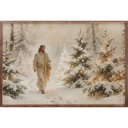 Framed wall art of robed figure walking through snowy Christmas tree forest