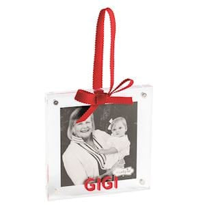 Clear acrylic photo frame ornament with red ribbon bow, labeled GIGI