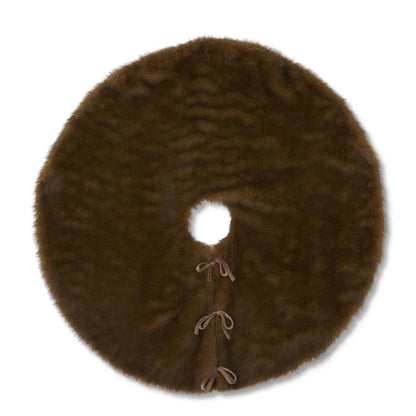 Round faux fur Christmas tree skirt in brown with center hole and ribbon tie closure, top view
