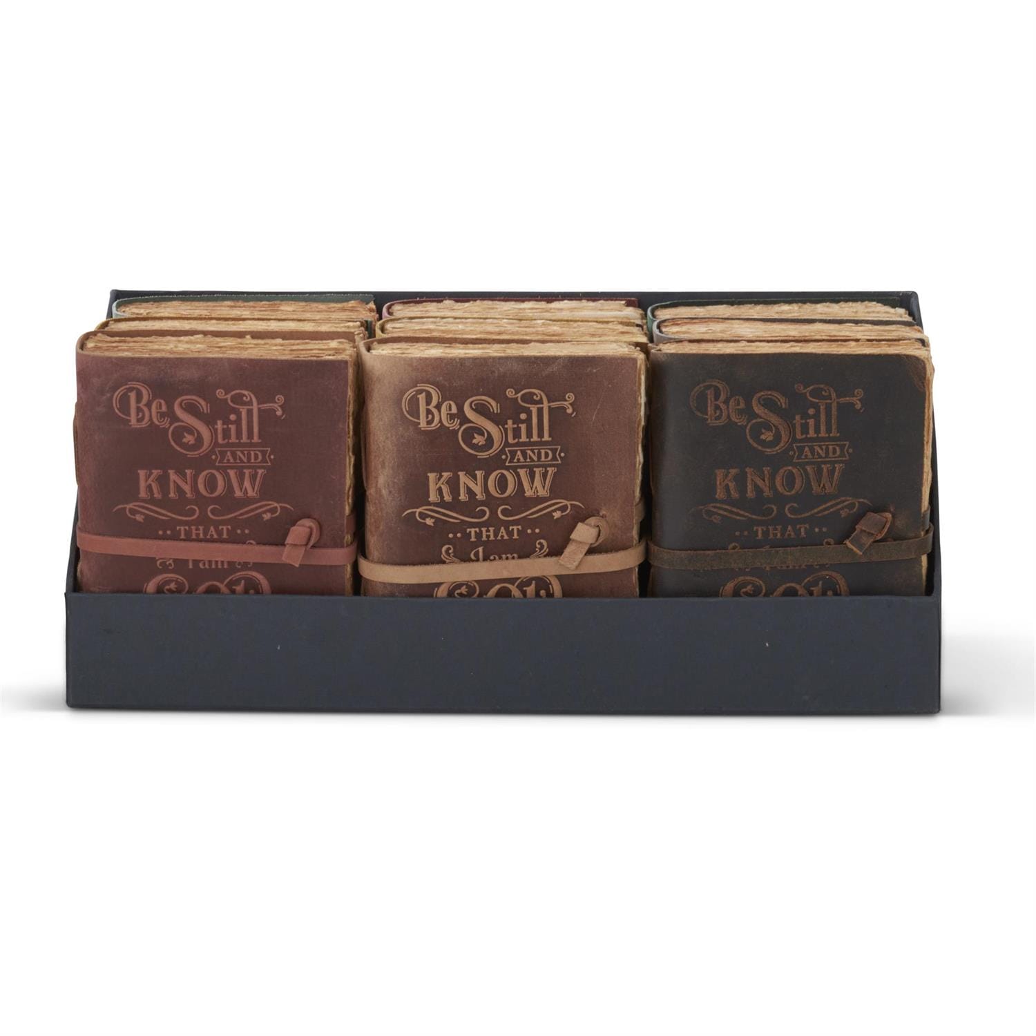 Three leather-bound embossed journals in brown, tan, and dark brown with strap closures