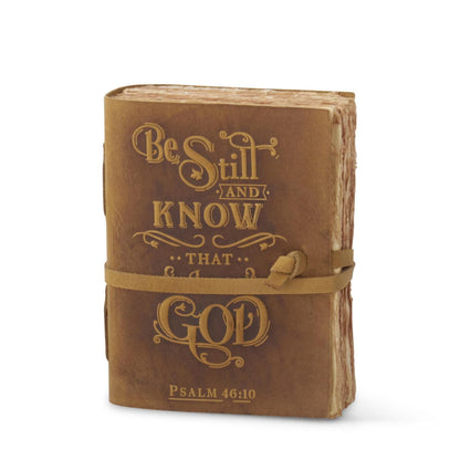 Tan leather journal embossed with Be Still and Know That God Psalm 46:10