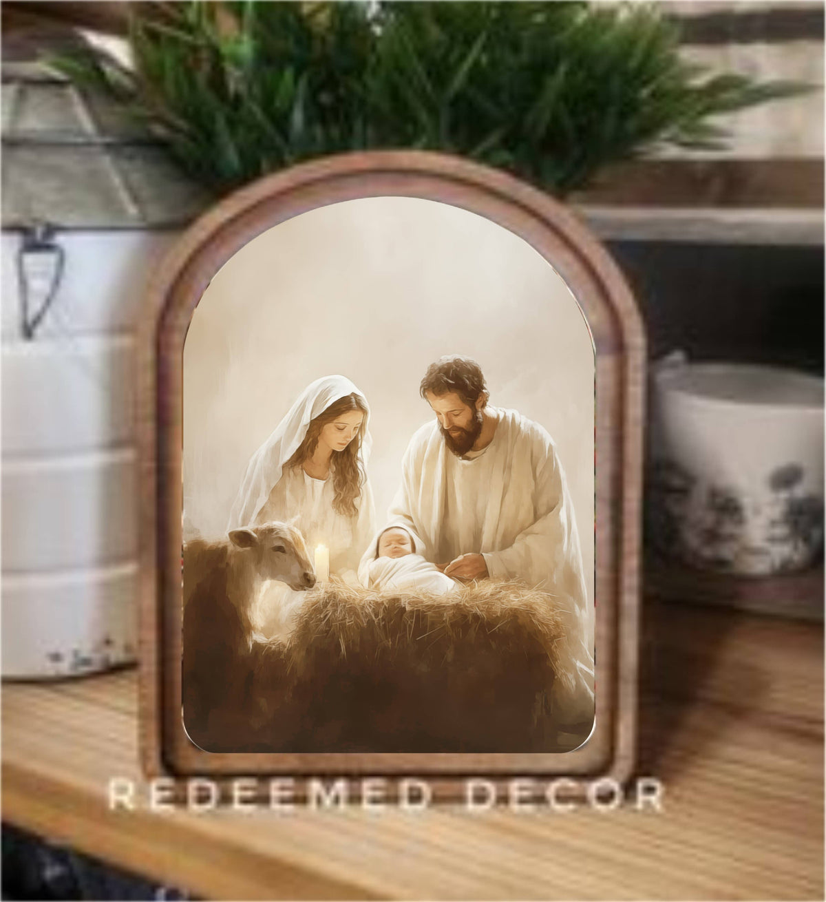 Arch-framed nativity canvas art with Mary, Joseph, and baby Jesus in manger
