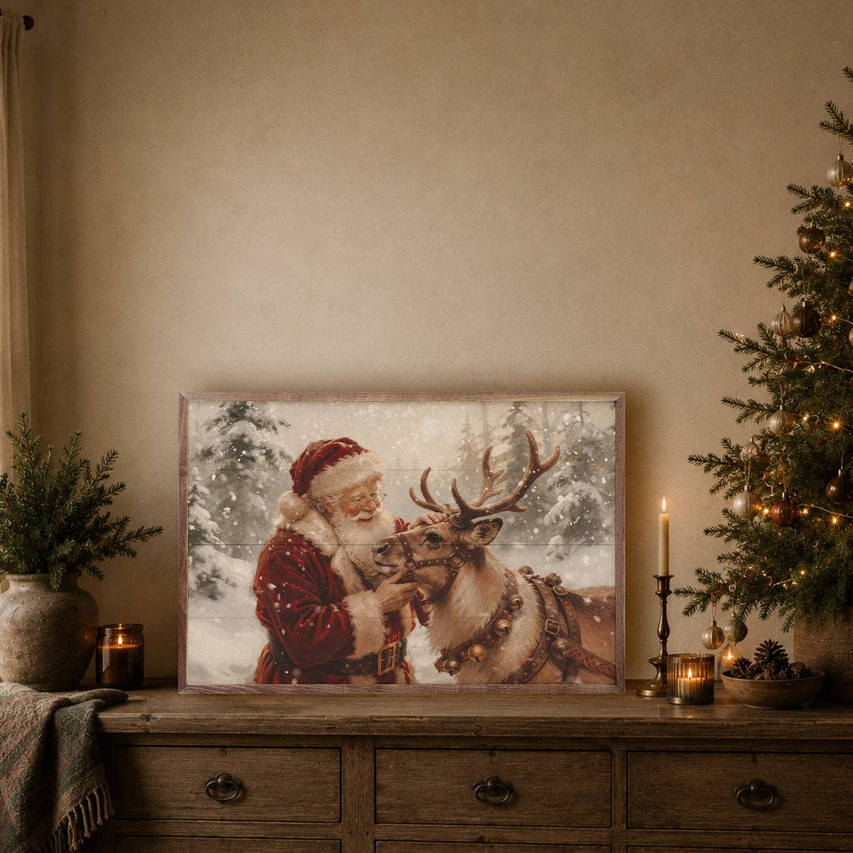 Framed Santa and reindeer canvas art displayed on rustic wooden dresser with Christmas decor