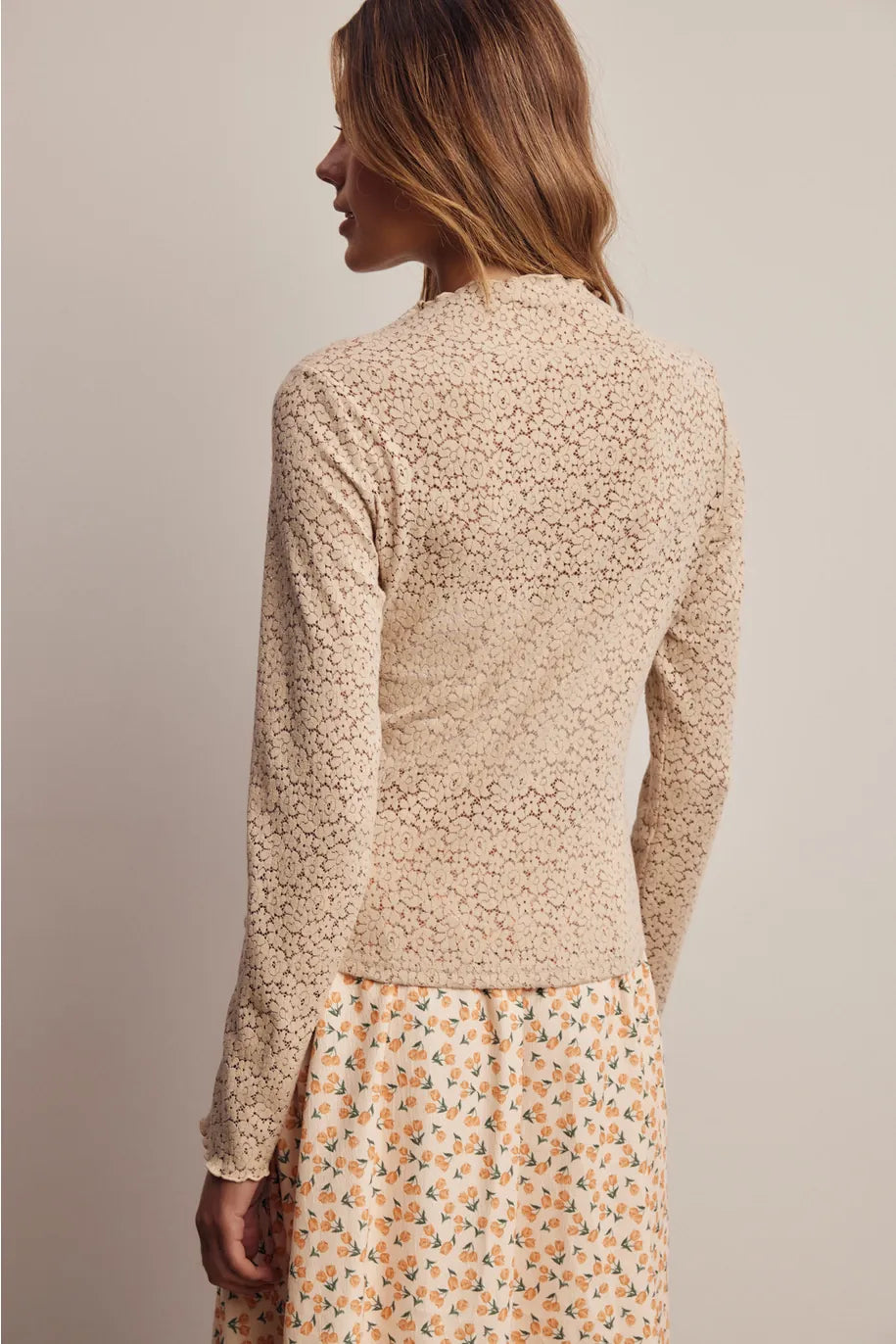 Cream stretch floral lace mock neck top with long sleeves, back view