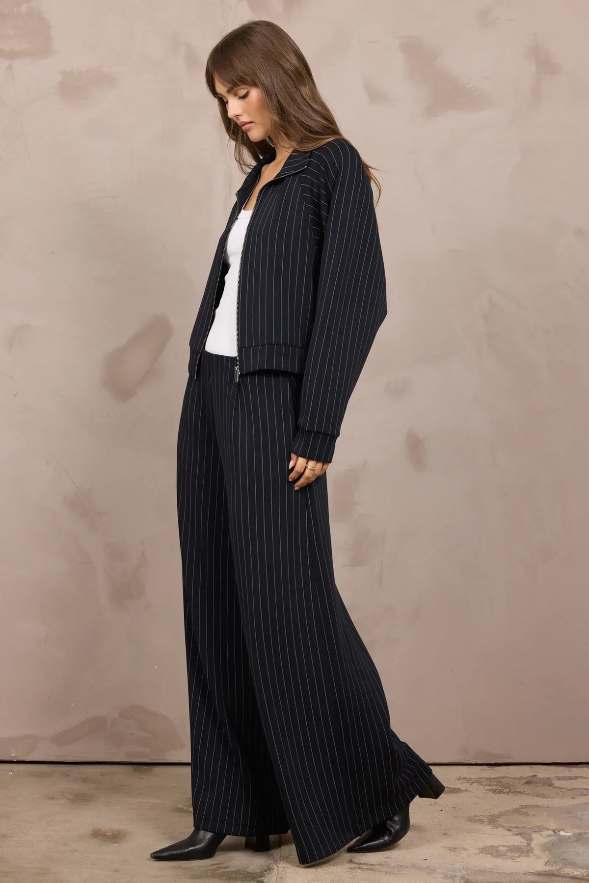 Navy pinstripe raglan zip-up cropped jacket with collared neckline and ribbed cuffs
