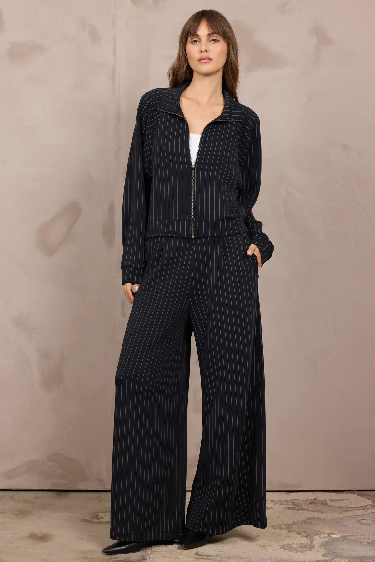 Black pinstripe raglan zip-up jacket with wide-leg matching trousers set