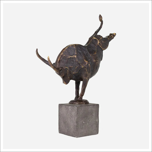 Dark bronze bull sculpture with textured patina mounted on square stone base