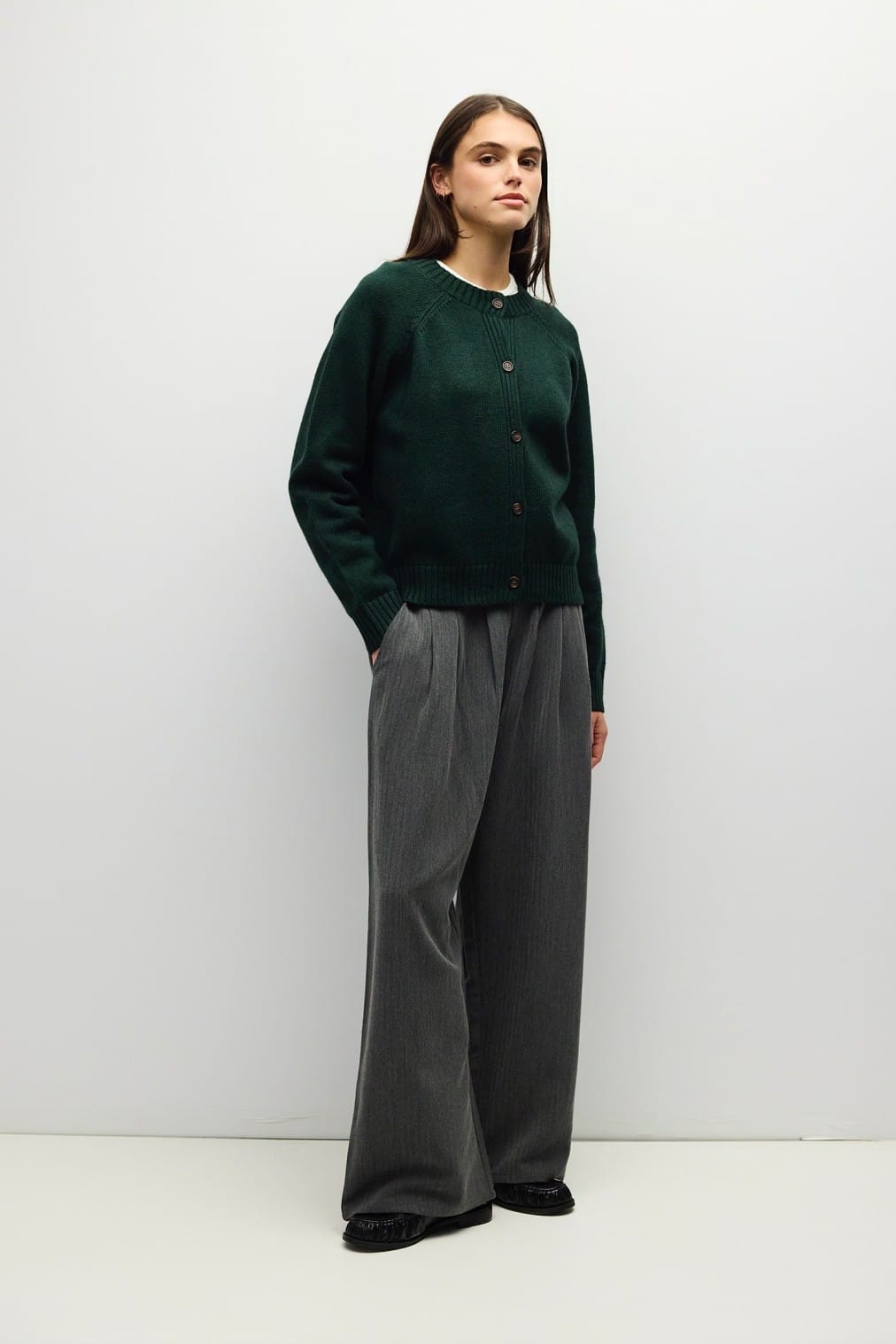 Forest green button-front cropped knit cardigan with ribbed cuffs and collar