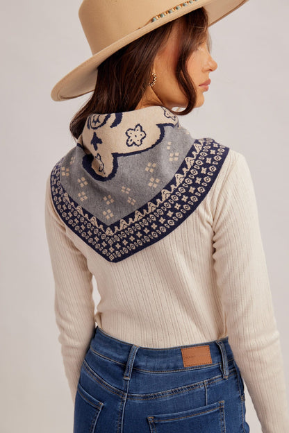 Navy and cream knit triangle bandana scarf with floral paisley pattern and geometric border