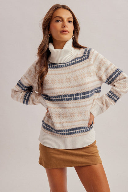 Ivory Fair Isle turtleneck sweater with blue and tan stripe pattern, long sleeves