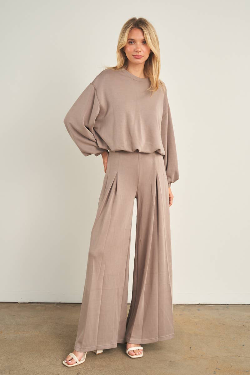 Taupe wide-leg palazzo pants with pleated front detail and high waist