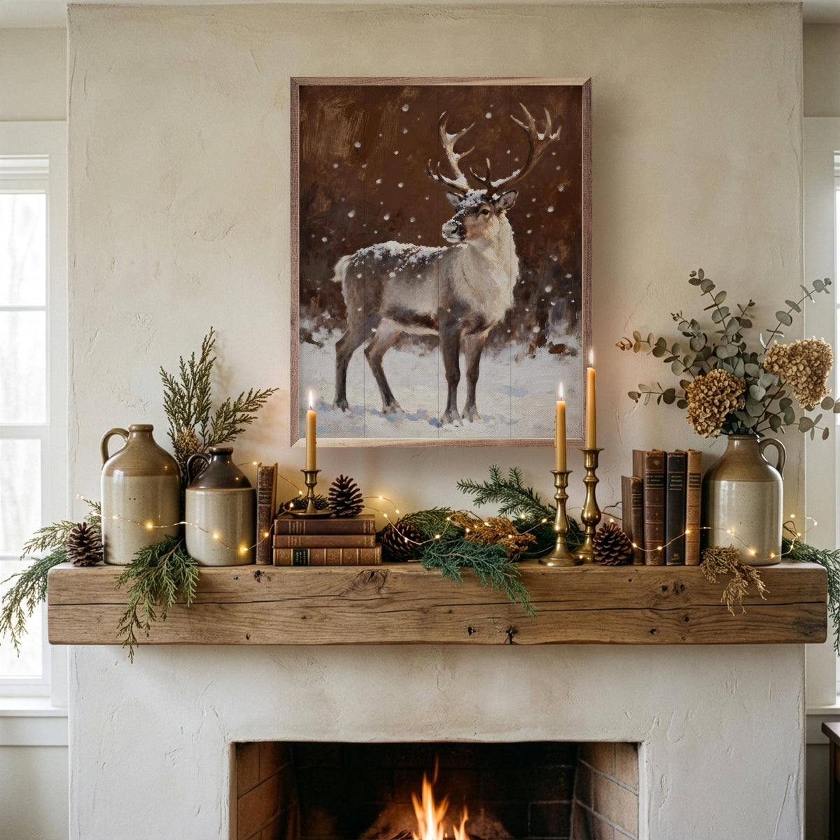 Framed reindeer painting in snow displayed above rustic wood fireplace mantel