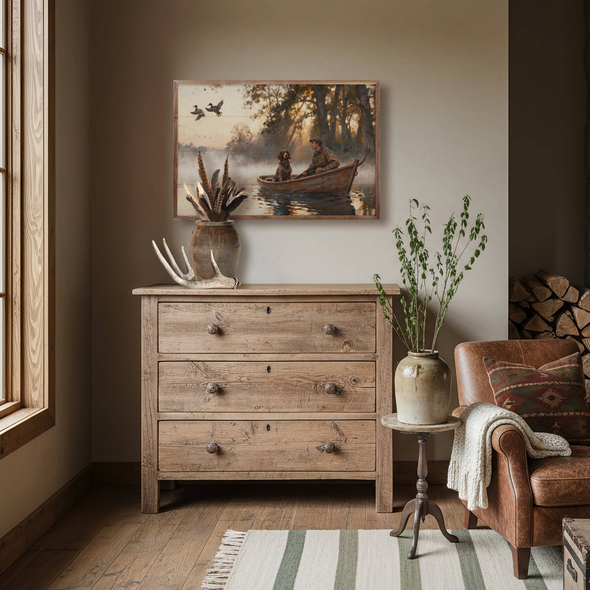 Rustic framed duck hunting painting displayed above a reclaimed wood dresser in a cozy room