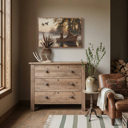 Rustic framed duck hunting painting displayed above a reclaimed wood dresser in a cozy room