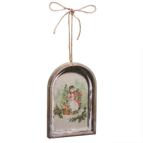 Arched wooden framed ornament with watercolor snowman, holiday greenery, and jute bow hanger