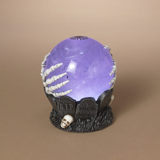 Halloween crystal ball water globe with skeleton hands, graveyard base, purple glow