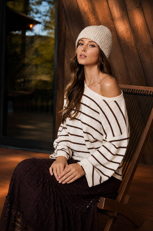 Cream and brown striped knit pullover sweater with drop shoulder and relaxed fit