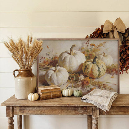 Framed autumn pumpkin still life art print in warm neutral tones on rustic wood table
