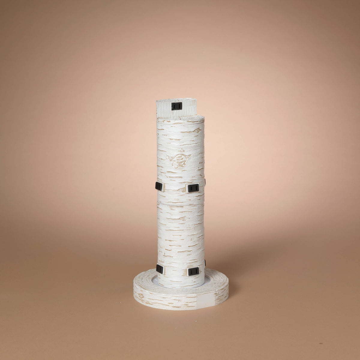 Cylindrical birch bark-textured tower display stand with round base and black nightlight outlets