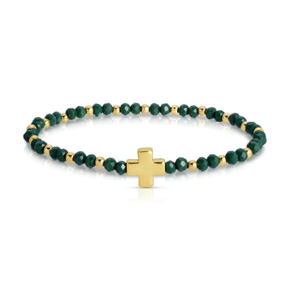 Green crystal and gold bead stretch bracelet with gold cross centerpiece