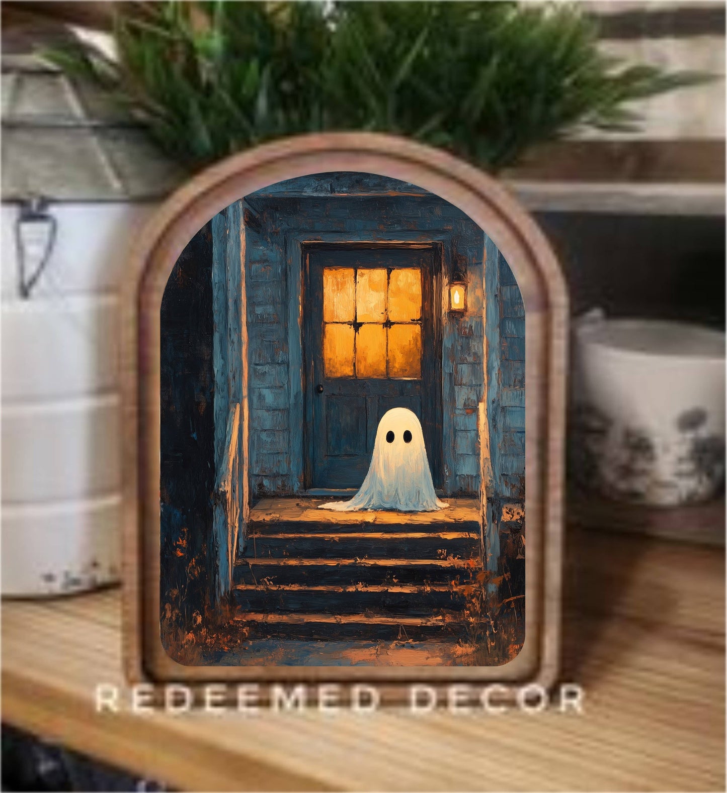 Arched wood-framed canvas art of ghost on glowing teal porch at night