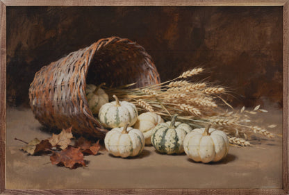 Framed fall still life art with white pumpkins, wheat stalks, wicker basket, autumn leaves