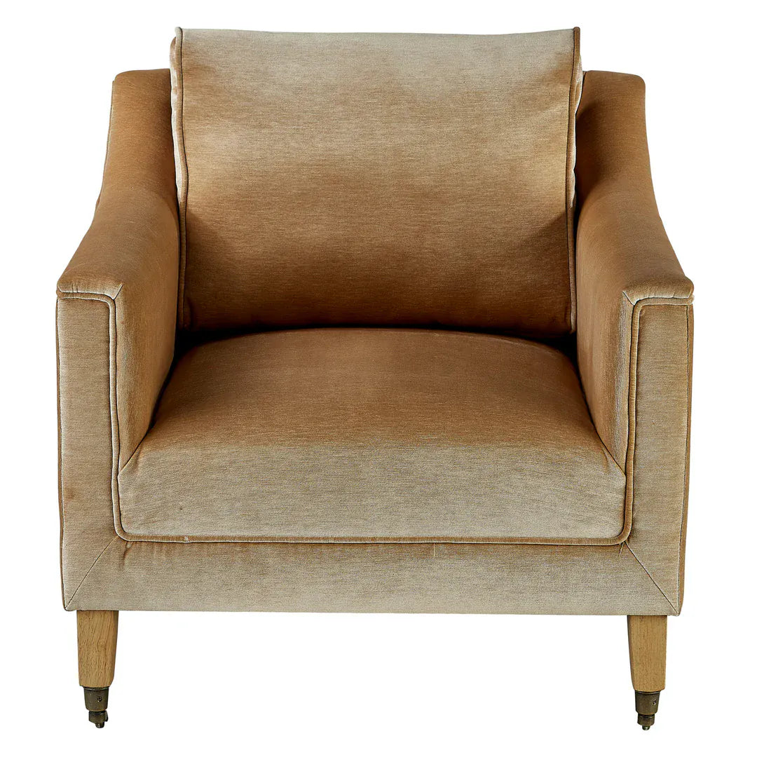 Forty West Breckin tan velvet accent chair with tapered wood legs and brass casters