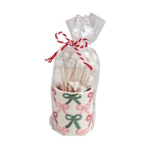 Ceramic bow-print toothpick caddy with wooden toothpicks, wrapped in clear cellophane bag