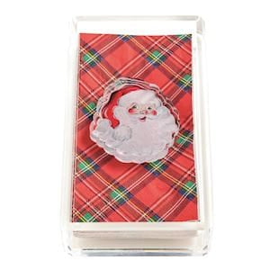 Red tartan guest towels in clear acrylic caddy with Santa Claus figurine topper
