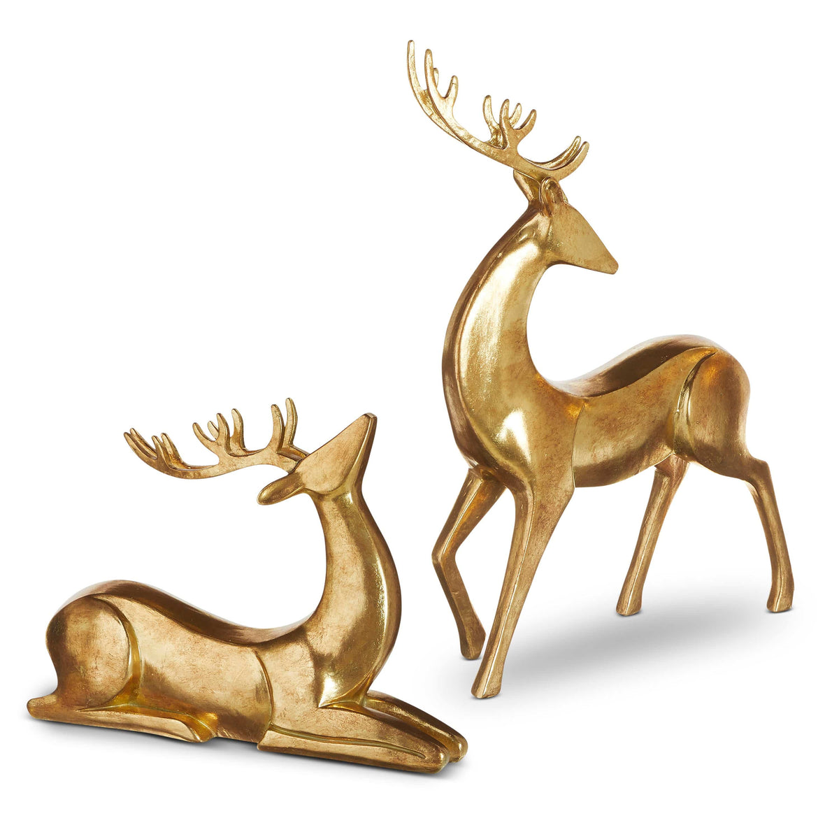 Two gold reindeer figurines, one standing and one lying down, with detailed antlers