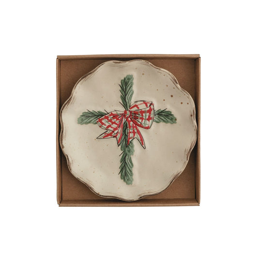 Cream ceramic tidbit plate with pine branch and red plaid bow design in kraft gift box