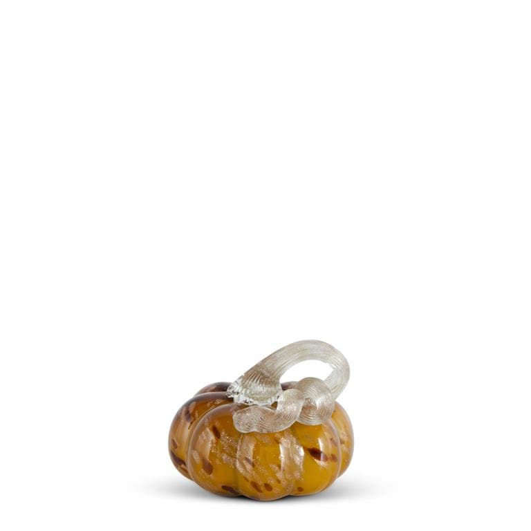 Small handblown glass pumpkin in amber yellow with brown speckles and clear stem