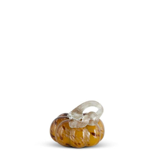 Small handblown glass pumpkin in amber yellow with brown speckles and clear stem